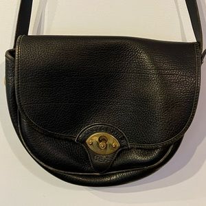 Dooney and Bourke made USA genuine leather black crossover handbag purse